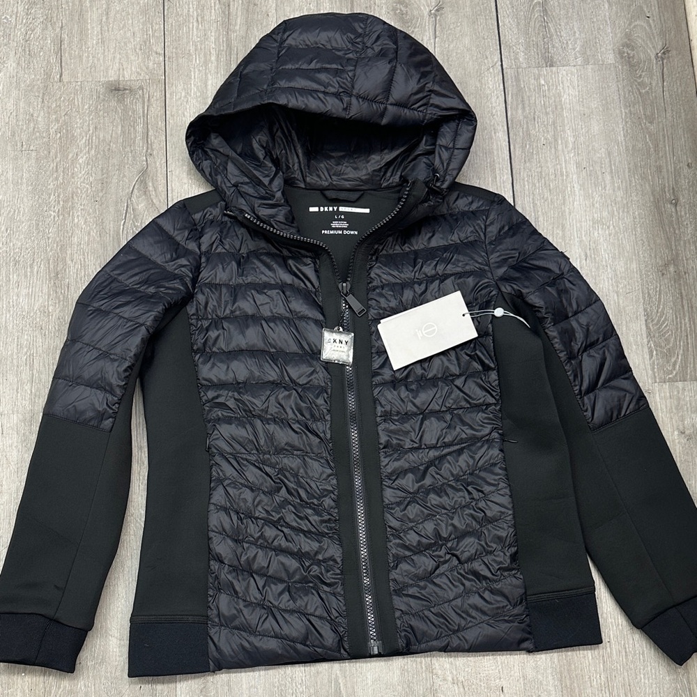 DKNY Sport Mixed Media Hooded Puffer Jacket in black.